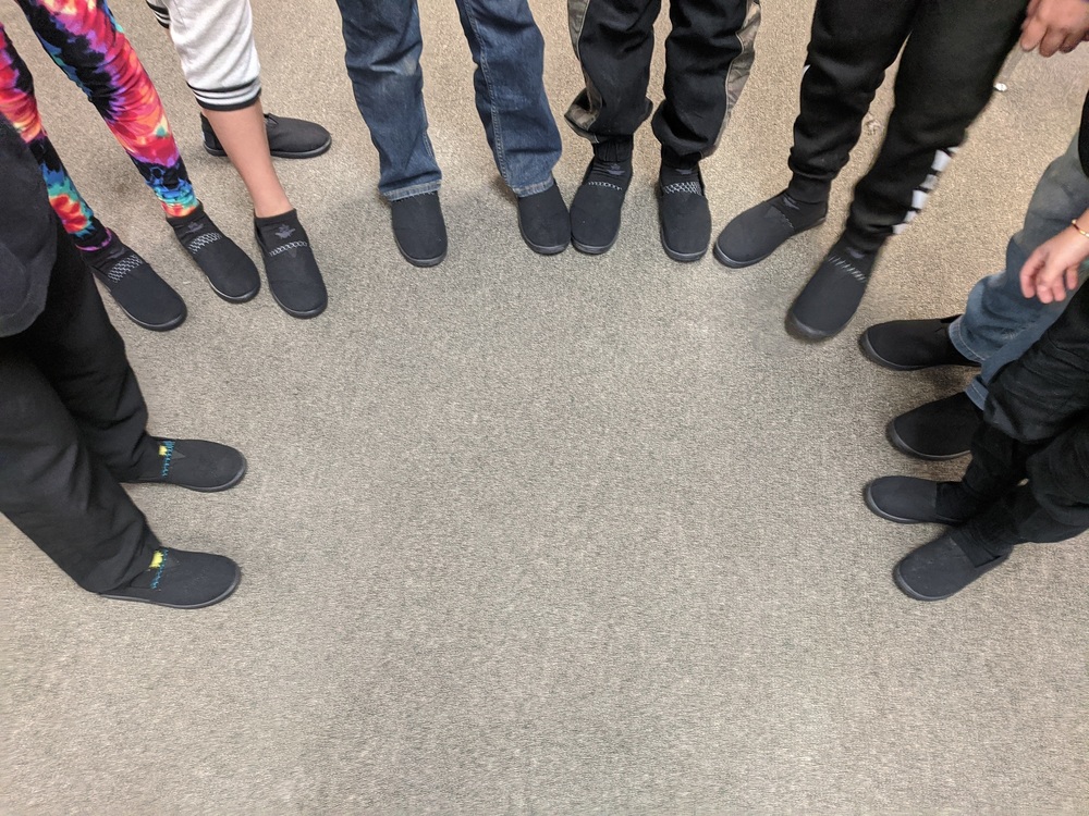 Students show off new shoes